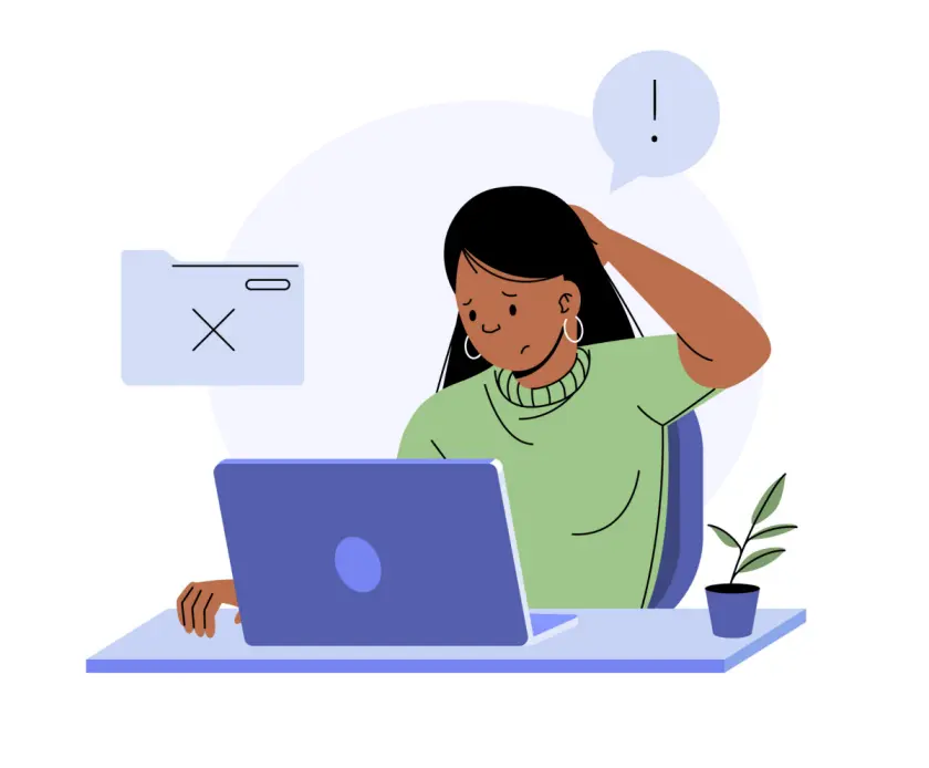 Woman looking confused at laptop